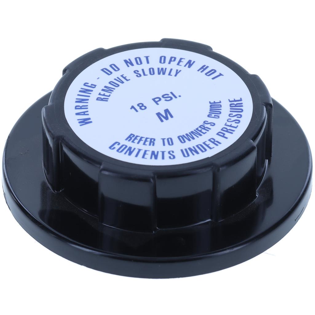 A black plastic automotive cap with a white circular label featuring blue text warning against opening hot caps and indicating 18 PSI.